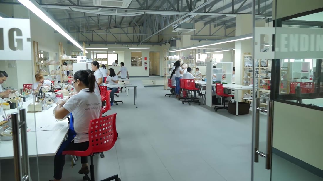 Production floor at The European Hair Factory, where HEADS hair systems are made by hand