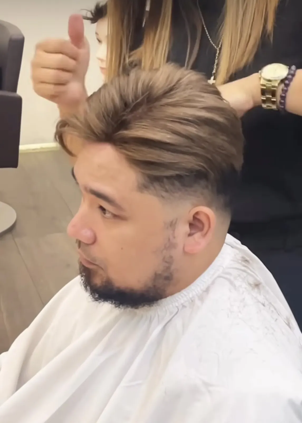 Real HEADS client — styled full hair with taper after his hair system, side view