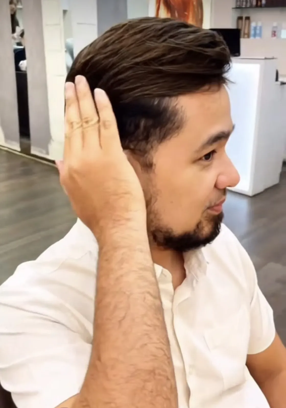 Real HEADS client — side profile with his full, natural hair system