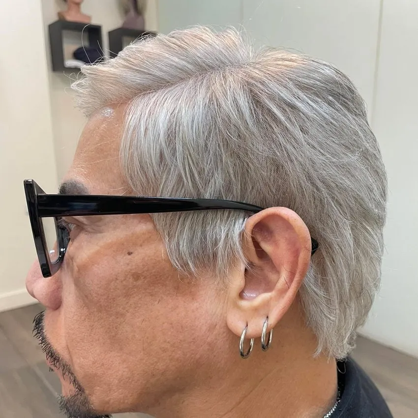 Real HEADS client with a styled grey hair system, natural at every angle
