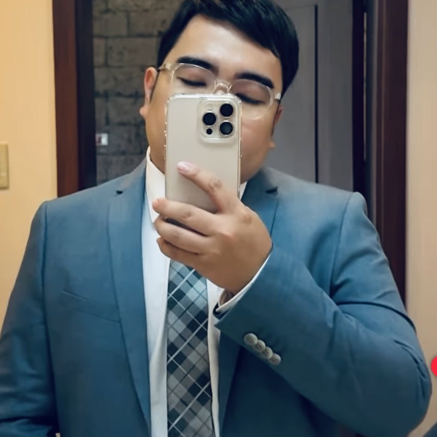 Real HEADS client in business attire with a natural hair system